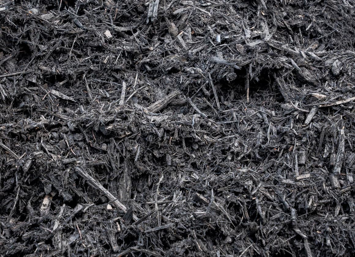Onyx black triple shred mulch for garden beds and landscaping