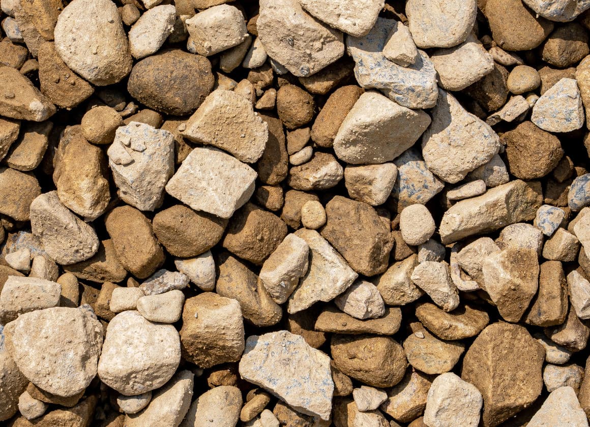 Mocha decorative stone used for a landscape bed in Baden, PA